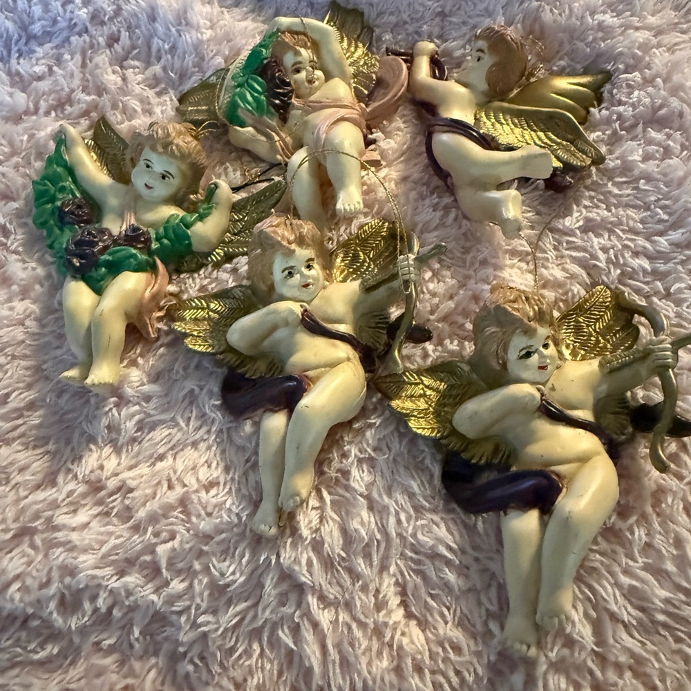 Vintage plastic cherub ornaments.
